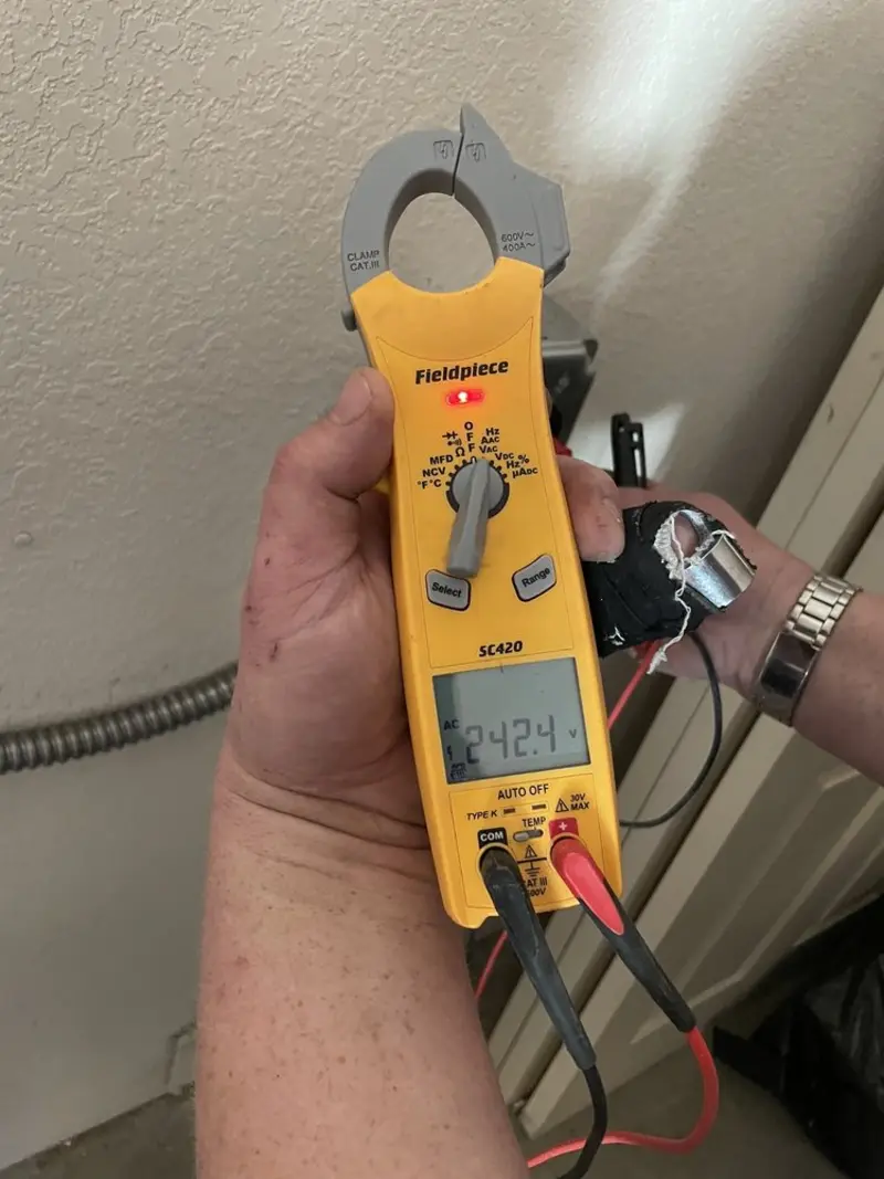 Voltage testing with clamp meter during Aluminum Wiring Replacement in Weddington